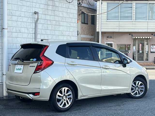 ホンダ フィット ハイブリット Fコンフォートエディション 神奈川県 2019(平31)年 2.4万km プレミアムアイボリーP 純正ディーラーナビ(CD/DVD/SD/BT/ワンセグTV)/バックカメラ/レーダークルーズコントロール/衝突被害軽減ブレーキ/レーンキープアシスト/前車両発進アラート/D/N席シートヒーター/ビルトインETC/前後ドライブレコーダー/フロントワイパーデアイサー/オートライト/フォグランプ/純正フロアマット/純正ドアバイザー/ISOFIX/保証書/取扱説明書