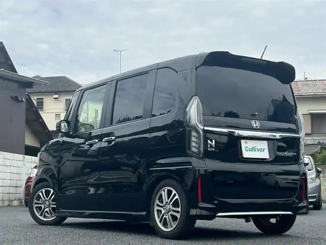 ホンダ Ｎ ＢＯＸ カスタム L ターボ 東京都 2021(令3)年 3.4万km クリスタルブラックパール ワンオーナー/純正ナビ（CH-HW851D）/・TV/CD/DVD/クルーズコントロール/オートライト/レーンアシスト/サイドカーテンエアバッグ/横滑り防止装置/盗難防止装置/シートヒーター/両側パワースライドドア/HONDA製14インチアルミホイール/ETC/スペアキー2本/取扱説明書/保証書