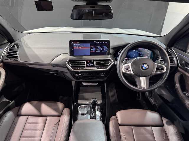 ＢＭＷ ＢＭＷ Ｘ３ 20d xDrive Mスポーツ 道央・札幌 2023(令5)年 2.3万km アルピンホワイトⅢ 電動パノラマ・ガラス・サンルーフ/ドライビング・アシスト・プロフェッショナル/・高速道路渋滞ハンズ・オフ・アシスト/・トラフィック・サイン・アシスト（速度制限認識）/・ACC/・ステアリング＆レーン・コントロール・アシスト/・レーン・ディパーチャー・ウォーニング/（車線逸脱警告システム）/・レーン・チェンジ・アシスト/・レーン・キーピング・アシスト/・クロス・トラフィック・ウォーニング/・クロスロード・ウォーニング/・前車接近警告機能/・後車衝突警告機能/・衝突回避・被害軽減ブレーキ/・エマージェンシー・ストップ・アシスト/パーキングアシストプラス/・PDC/・パーキングアシスト/・トップビュー＋３Dビュー/・サイドビューカメラ/・リアビューカメラ（予想進路表示機能付）/アダプティブLEDヘッドライト/電動フロントシート/運転席メモリー機能付/フロントシートヒーティング/リアシートヒーティング/BMWライブコックピット/・１２・３インチマルチディスプレイ・メーターパネル/・１２・３インチワイド・コントロール・ディスプレイ/・HDDナビ