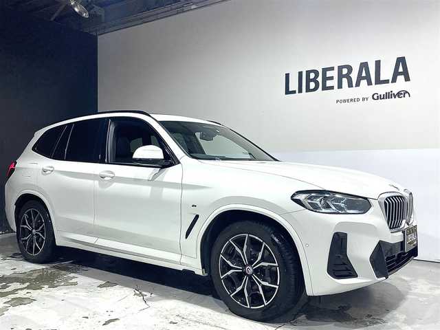 ＢＭＷ ＢＭＷ Ｘ３ 20d xDrive Mスポーツ 道央・札幌 2023(令5)年 2.3万km アルピンホワイトⅢ 電動パノラマ・ガラス・サンルーフ/ドライビング・アシスト・プロフェッショナル/・高速道路渋滞ハンズ・オフ・アシスト/・トラフィック・サイン・アシスト（速度制限認識）/・ACC/・ステアリング＆レーン・コントロール・アシスト/・レーン・ディパーチャー・ウォーニング/（車線逸脱警告システム）/・レーン・チェンジ・アシスト/・レーン・キーピング・アシスト/・クロス・トラフィック・ウォーニング/・クロスロード・ウォーニング/・前車接近警告機能/・後車衝突警告機能/・衝突回避・被害軽減ブレーキ/・エマージェンシー・ストップ・アシスト/パーキングアシストプラス/・PDC/・パーキングアシスト/・トップビュー＋３Dビュー/・サイドビューカメラ/・リアビューカメラ（予想進路表示機能付）/アダプティブLEDヘッドライト/電動フロントシート/運転席メモリー機能付/フロントシートヒーティング/リアシートヒーティング/BMWライブコックピット/・１２・３インチマルチディスプレイ・メーターパネル/・１２・３インチワイド・コントロール・ディスプレイ/・HDDナビ