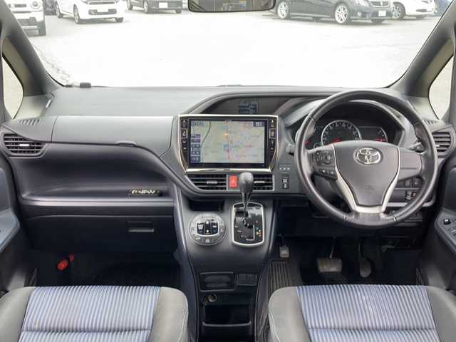 トヨタ ヴォクシー ZS 煌 富山県 2016(平28)年 14.2万km ホワイトパールクリスタルシャイン ALPINEフリップダウンモニター/ドアバイザー/社外サマータイヤ/ビルドインETC/ALPINEナビ/両側パワースライドドア/オートライト