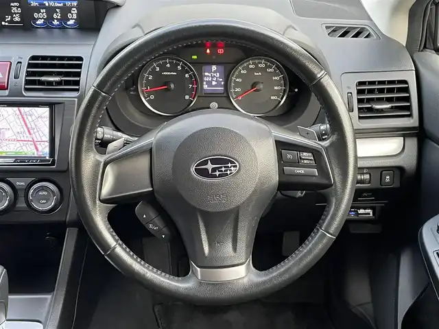 スバル インプレッサ ＸＶ 2．0i 岡山県 2013(平25)年 2.3万km ダークグレーメタリック 登録時走行距離22121キロ/社外メモリナビ/AM/FM/Bluetooth/TV/SD/AUX/アイドリングストップ/クルーズコントロール/バックカメラ/純正17インチAW/横滑り防止装置/オートライト/リモコンキー/ハロゲンライト/保証書、取説有
