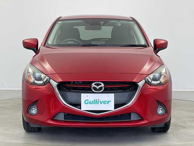 マツダ デミオ XD ツーリング 新潟県 2016(平28)年 9.5万km ソウルレッドプレミアムメタリック 純正7インチナビ　CD・DVD・Bluetooth/フルセグ/前席両側シートヒーター/LEDライト/ETC/パドルシフト/クルーズコントロール/ステアリングリモコン/前側ドライブレコーダー