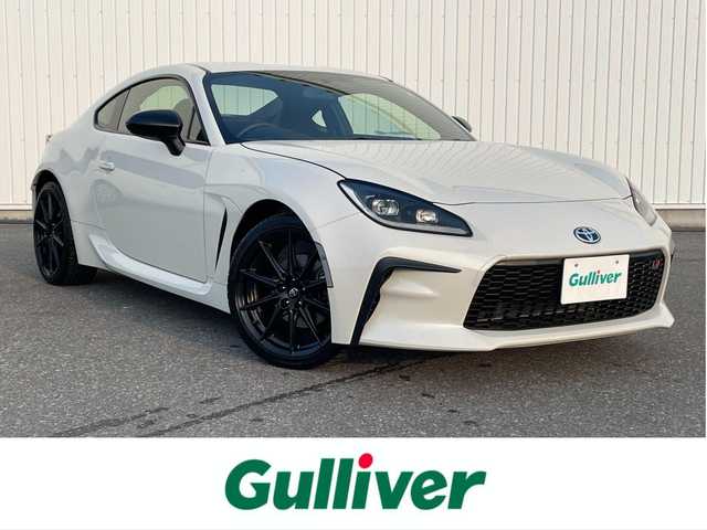 トヨタ ＧＲ８６ RZ 滋賀県 2022(令4)年 0.6万km クリスタルホワイトパール ６速ＭＴ/９インチＳＤナビ/（MDV-M909HDL）/AM/FM/CD/DVD/iPod/Bluetooth/フルセグＴＶ（走行視聴可能）/バックカメラ/クルーズコントロール/ブラインドスポットモニター/前席シートヒーター/ハーフレザーシート/ＳＲＨ/（ステアリング連動ヘッドランプ）/ＬＥＤヘッドライト/純正アルミホイール/ドライブレコーダー/（DRJ-AN1A）/ETC/オートエアコン/ダブルエアバッグ/スマートキー/プッシュスタート/純正フロアマット/ABS/横滑り防止装置/盗難防止装置/取扱説明書/保証書/整備記録簿/禁煙車