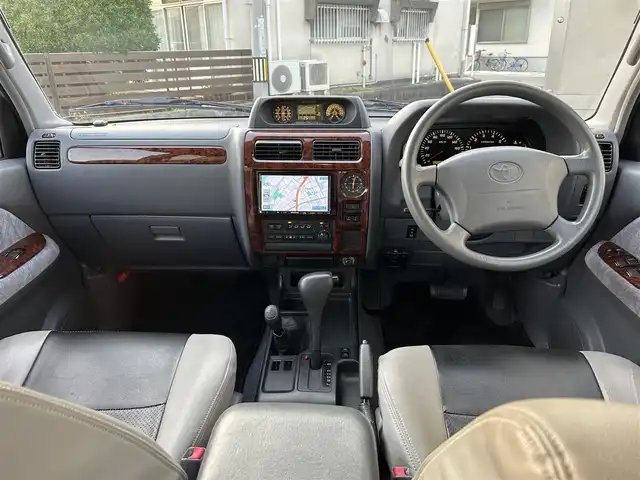 トヨタ ランドクルーザー プラド TX－LTD 愛知県 2000(平12)年 10.8万km 青 4WD/バックカメラ/サンルーフ/背面タイヤ/ルーフレール/社外SDナビ/Bluetooth/DVD/CD/フルセグTV/社外ETC/格納三列シート/社外フロアマット/社外アルミホイール/オフロードタイヤ/パワーステアリング/パワーウインドウ/ABS/取扱説明書/リモコンキー