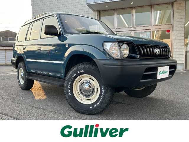 トヨタ ランドクルーザー プラド TX－LTD 愛知県 2000(平12)年 10.8万km 青 4WD/バックカメラ/サンルーフ/背面タイヤ/ルーフレール/社外SDナビ/Bluetooth/DVD/CD/フルセグTV/社外ETC/格納三列シート/社外フロアマット/社外アルミホイール/オフロードタイヤ/パワーステアリング/パワーウインドウ/ABS/取扱説明書/リモコンキー