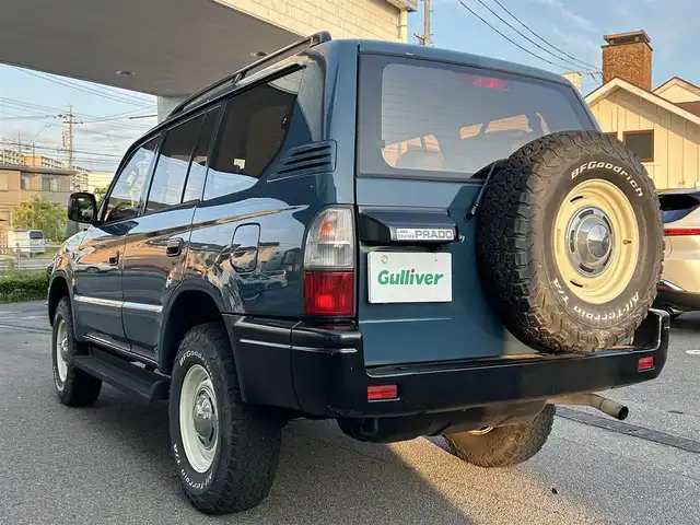 トヨタ ランドクルーザー プラド TX－LTD 愛知県 2000(平12)年 10.8万km 青 4WD/バックカメラ/サンルーフ/背面タイヤ/ルーフレール/社外SDナビ/Bluetooth/DVD/CD/フルセグTV/社外ETC/格納三列シート/社外フロアマット/社外アルミホイール/オフロードタイヤ/パワーステアリング/パワーウインドウ/ABS/取扱説明書/リモコンキー