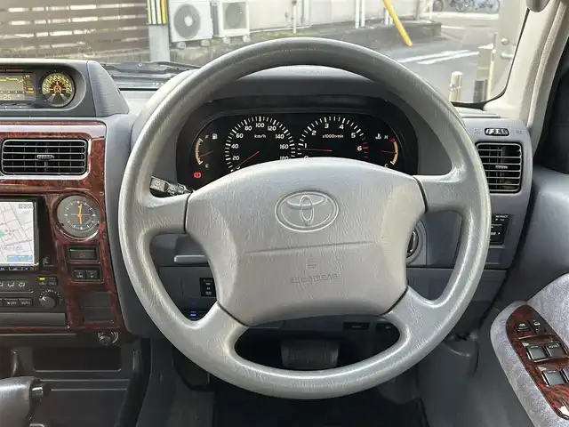 トヨタ ランドクルーザー プラド TX－LTD 愛知県 2000(平12)年 10.8万km 青 4WD/バックカメラ/サンルーフ/背面タイヤ/ルーフレール/社外SDナビ/Bluetooth/DVD/CD/フルセグTV/社外ETC/格納三列シート/社外フロアマット/社外アルミホイール/オフロードタイヤ/パワーステアリング/パワーウインドウ/ABS/取扱説明書/リモコンキー