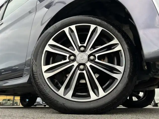 ダイハツ タント カスタム RS トップED SAⅡ 愛媛県 2015(平27)年 6.8万km メテオライトグレーイリュージョナルP 登録時走行距離：67797Km/ディーラーOP社外メモリナビ/フルセグTV/Bluetooth/CD/DVD/アイドリングストップ/社外ETC/前ドラレコ/後コーナーセンサー/スマートキー/ベンチシート/両側パワスラ/横滑り防止装置/盗難防止装置/衝突軽減システム/LEDヘッドライト/オートライト/フォグランプ/エンジンスタートボタン/スマートキー/純正アルミホイール/純正フロアマット/サンシェード