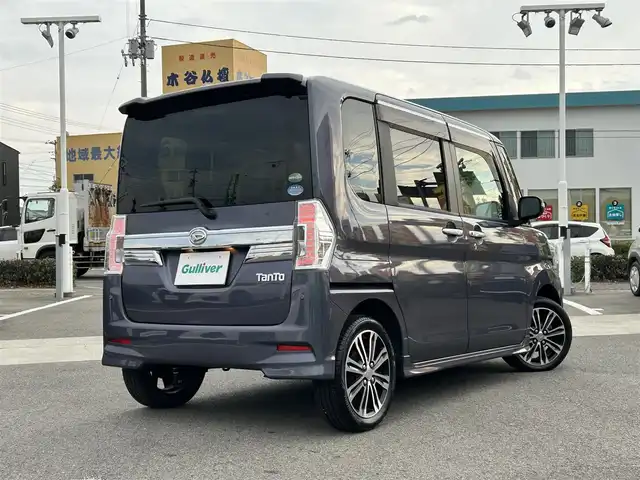 ダイハツ タント カスタム RS トップED SAⅡ 愛媛県 2015(平27)年 6.8万km メテオライトグレーイリュージョナルP 登録時走行距離：67797Km/ディーラーOP社外メモリナビ/フルセグTV/Bluetooth/CD/DVD/アイドリングストップ/社外ETC/前ドラレコ/後コーナーセンサー/スマートキー/ベンチシート/両側パワスラ/横滑り防止装置/盗難防止装置/衝突軽減システム/LEDヘッドライト/オートライト/フォグランプ/エンジンスタートボタン/スマートキー/純正アルミホイール/純正フロアマット/サンシェード