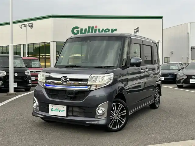 ダイハツ タント カスタム RS トップED SAⅡ 愛媛県 2015(平27)年 6.8万km メテオライトグレーイリュージョナルP 登録時走行距離：67797Km/ディーラーOP社外メモリナビ/フルセグTV/Bluetooth/CD/DVD/アイドリングストップ/社外ETC/前ドラレコ/後コーナーセンサー/スマートキー/ベンチシート/両側パワスラ/横滑り防止装置/盗難防止装置/衝突軽減システム/LEDヘッドライト/オートライト/フォグランプ/エンジンスタートボタン/スマートキー/純正アルミホイール/純正フロアマット/サンシェード