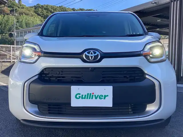 トヨタ シエンタ ハイブリッド Z 鹿児島県 2024(令6)年 0.5万km ホワイトパールクリスタルシャイン ワンオーナー/禁煙車/純正ナビフルセグTV/左右パワースライドドア/ビルトインETC/シートヒーター左右/ステアリングヒーター/全方位モニターバックカメラ/AC100v電源/オートハイビーム/パークアシスト/BSM/レーンキープアシスト/純正ドラレコ/レーダーブレーキ/クルーズコントロール/純正15インチアルミ