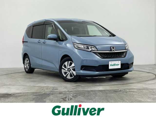 ホンダ フリード ハイブリット G ホンダセンシング 群馬県 2021(令3)年 4.6万km シーグラスブルーパール 純正９インチナビ　バックカメラ　両側パワースライドドア　レーダークルーズコントロール　ＬＥＤ　シートヒーター　ステアリングリモコン　コーナーセンサー　スマートキー　横滑り防止装置　ＥＴＣ　禁煙車