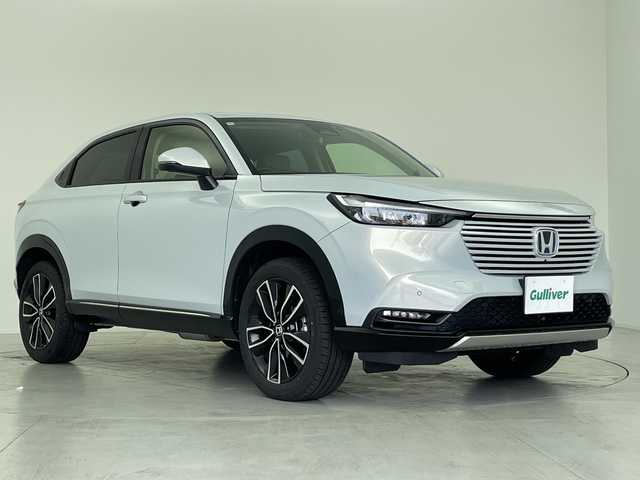ホンダ ヴェゼル ハイブリッド e:HEV Z 愛知県 2024(令6)年 2.4万km プレミアムサンライトホワイトパール 純正ナビ/・フルセグ/・Bluetooth/マルチビューカメラシステム/ビルドインETC2.0/前後ドライブレコーダー/前席シートヒーター/ステアリングヒーター/ABS/レーンキープアシスト/車線逸脱抑制装置/コーナーセンサー/衝突軽減ブレーキ/横滑り防止装置/先行車発信告知機能/標識認識機能/盗難防止装置/ワイヤレス充電器/オートライト/純正18インチアルミホイール/オートライト/LEDヘッドライト/パワーステアリング/パワーウィンドウ/純正アルミホイール/純正フロアマット