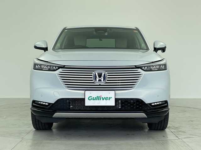 ホンダ ヴェゼル ハイブリッド e:HEV Z 愛知県 2024(令6)年 2.4万km プレミアムサンライトホワイトパール 純正ナビ/・フルセグ/・Bluetooth/マルチビューカメラシステム/ビルドインETC2.0/前後ドライブレコーダー/前席シートヒーター/ステアリングヒーター/ABS/レーンキープアシスト/車線逸脱抑制装置/コーナーセンサー/衝突軽減ブレーキ/横滑り防止装置/先行車発信告知機能/標識認識機能/盗難防止装置/ワイヤレス充電器/オートライト/純正18インチアルミホイール/オートライト/LEDヘッドライト/パワーステアリング/パワーウィンドウ/純正アルミホイール/純正フロアマット