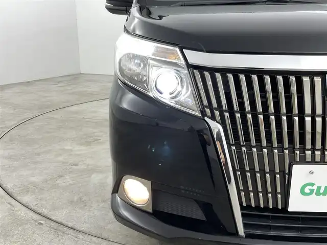 トヨタ エスクァイア 福島県 2014(平26)年 7.1万km ブラック トヨタセーフティセンス/・衝突被害軽減ブレーキ/・車線逸脱警報装置/・レーダークルーズコントロール/・アダプティブハイビーム/純正9インチナビ/・型番：NSZT-Y64T/・フルセグTV/BT/SD/CD/DVD/FM/AM/・バックカメラ/・ETC/両側パワースライドドア/・スライドドアロールサンシェード/革張ステアリング/・ステアリングリモコン/MTモード付AT/レザーシート/・D+N席シートヒーター/アイドリングストップ/プッシュスタート/・スマートキー/電動格納ミラー/・ウィンカーミラー/・オートミラー/LEDヘッドライト/・フォグランプ/・オートライト/・オートハイビーム/寒冷地仕様/純正フロアマット/純正15インチAW