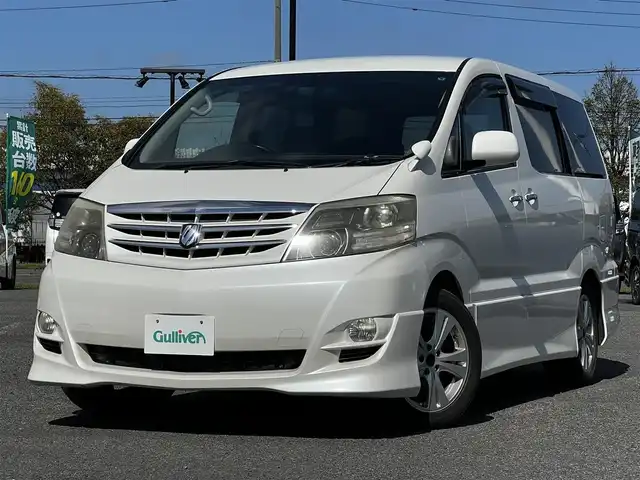 トヨタ アルファード Ｖ AS プラチナセレクション 道央・札幌 2006(平18)年 11.6万km ホワイトパールマイカ ４WD/ワンオーナー/純正HDDナビ/FM/CD/DVD/SD/AUX/バックカメラ/両側パワースライドドア/パワーバックドア/革巻きウッドコンビステアリング/ステアリングリモコン/リモコンキー/ハロゲンヘッドライト/オートライト/フォグランプ/電動格納ミラー/純正フロアマット/ドアバイザー/純正エンジンスターター/純正AW付冬タイヤ積込/225/55/R17/2014年/山4mm