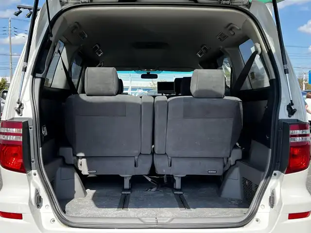 トヨタ アルファード Ｖ AS プラチナセレクション 道央・札幌 2006(平18)年 11.6万km ホワイトパールマイカ ４WD/ワンオーナー/純正HDDナビ/FM/CD/DVD/SD/AUX/バックカメラ/両側パワースライドドア/パワーバックドア/革巻きウッドコンビステアリング/ステアリングリモコン/リモコンキー/ハロゲンヘッドライト/オートライト/フォグランプ/電動格納ミラー/純正フロアマット/ドアバイザー/純正エンジンスターター/純正AW付冬タイヤ積込/225/55/R17/2014年/山4mm