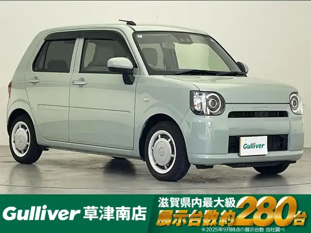 ダイハツ ミラ トコット G SA Ⅲ 滋賀県 2022(令4)年 3.2万km セラミックグリーンM 社外6.8インチディスプレイオーディオ/【Bluetooth/CD/DVD/USB】/クリアランスソナー/衝突被害軽減ブレーキ/LEDヘッドライト/オートマチックハイビーム/D/Nシートヒーター/ETC/プッシュスタート/スマートキー