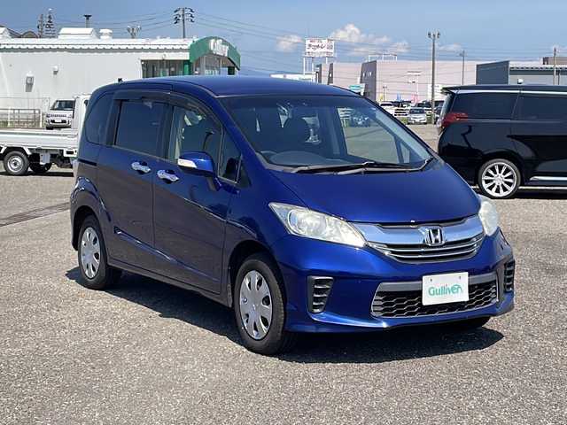 ホンダ フリード G プレミアムエディション 新潟県 2015(平27)年 9.1万km コバルトブルーパール 4WD/社外SDナビ(CN-R300D)/CD/DVD/フルセグテレビ/SDミュージックサーバー/バックカメラ/ETC/クルーズコントロール/両側パワースライドドア/半革シート/ステアリングスイッチ/スマートキー/キセノンヘッドライト/オートライト/社外15インチAW冬タイヤ車載