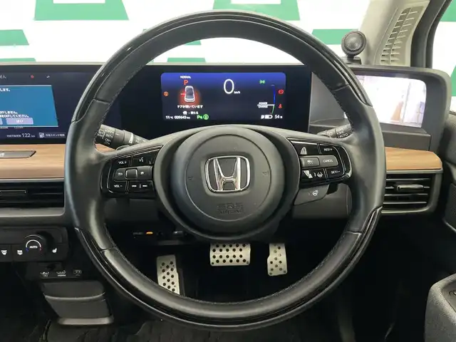 ホンダ ホンダｅ 鹿児島県 2021(令3)年 1万km クリスタルブラックパール ワイドビジョンインストルメントパネル/・ワイドスクリーンHondaCONNECTディスプレー/・マルチタスク機能/・Hondaパーソナルアシスタント/・サイドカメラミラーシステム/フルセグTV/BT/AppleCarPlay/AndroidAuto/スカイルーフ/ホンダセンシング/バックカメラ/ステアリングヒーター/助手席シートヒーター/運転席RECAROシート/パイオニア製サブウーファー/デジタルインナーミラー/LEDヘッドライト/ETC2.0/純正フロアマット