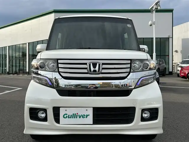 ホンダ Ｎ ＢＯＸ カスタム G ターボパッケージ 愛媛県 2012(平24)年 4.9万km プレミアムホワイトパール 純正ナビ（VXM-128VSX）/CD/DVD/ワンセグ/SD/バックカメラ/ETC/ドライブレコーダー（フロント）/クルーズコントロール/オートライト/LEDヘッドライト/ハロゲンフォグランプ/スマートキー/両側パワースライドドア/オートエアコン/MTモード付AT/純正マット/純正アルミホイール