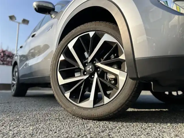 三菱 アウトランダー ＰＨＥＶ G 東京都 2023(令5)年 1.8万km チタニウムグレーメタリック ワンオーナー/3列シート/7人乗り/純正9インチナビ/・Bluetoothオーディオ/USBオーディオ/・AppleCarPlay/AndroidAuto/フルセグTV/マイパイロット/eアシスト/マルチアラウンドモニター/パワーシート（運転席）/シートヒーター（前席）/ハンズフリーパワーバックドア/取扱説明書/保証書/・ディーラー点検記録簿（R6/R7）/スペアキー1本