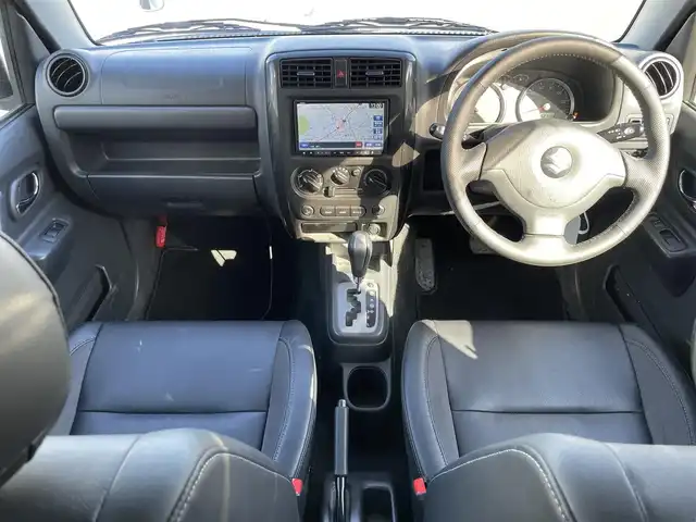 スズキ ジムニー クロスアドベンチャー XC 静岡県 2012(平24)年 5.3万km パールホワイト 社外ナビ/（AM/FM/CD/DVD）/ワンセグTV/リモコンキー/レザーシート/運転席シートヒーター/４WD/純正16インチアルミホイール/純正16インチアルミホイール付きスタッドレスタイヤ積込/純正フロアマット/背面タイヤ/取扱説明書/保証書