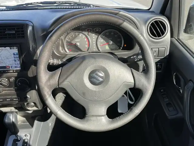スズキ ジムニー クロスアドベンチャー XC 静岡県 2012(平24)年 5.3万km パールホワイト 社外ナビ/（AM/FM/CD/DVD）/ワンセグTV/リモコンキー/レザーシート/運転席シートヒーター/４WD/純正16インチアルミホイール/純正16インチアルミホイール付きスタッドレスタイヤ積込/純正フロアマット/背面タイヤ/取扱説明書/保証書