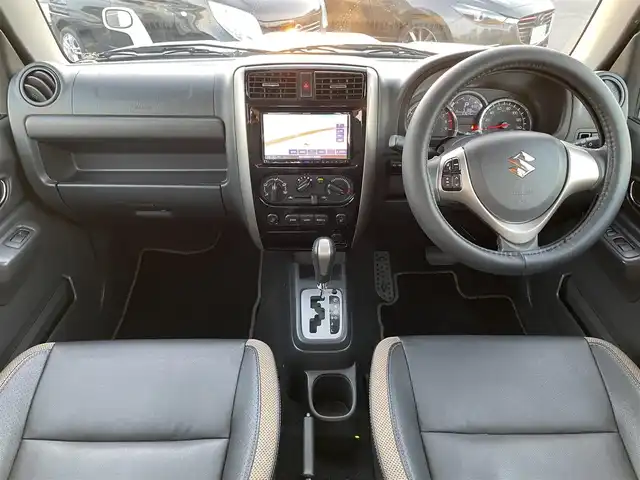 スズキ ジムニー ランドベンチャー 鳥取県 2017(平29)年 6.4万km パールホワイト ４ＷＤ・ターボ/社外ナビ／ＴＶ／ＤＶＤ／ＣＤ／ＢＴ/ＥＴＣ/ドライブレコーダー/レザーシート/前席シートヒーター/モンスタースポーツハイトアップスプリング/（純正車高　プラス20ｍｍ）/スズキスポーツショックアブソーバー/純正１６アルミホイール/キーレスキー/純正フォグランプ/電動格納ミラー/背面タイヤ/スペアキー