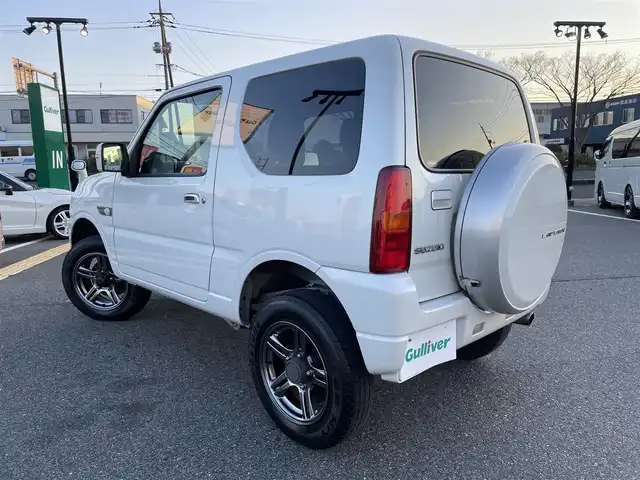 スズキ ジムニー ランドベンチャー 鳥取県 2017(平29)年 6.4万km パールホワイト ４ＷＤ・ターボ/社外ナビ／ＴＶ／ＤＶＤ／ＣＤ／ＢＴ/ＥＴＣ/ドライブレコーダー/レザーシート/前席シートヒーター/モンスタースポーツハイトアップスプリング/（純正車高　プラス20ｍｍ）/スズキスポーツショックアブソーバー/純正１６アルミホイール/キーレスキー/純正フォグランプ/電動格納ミラー/背面タイヤ/スペアキー