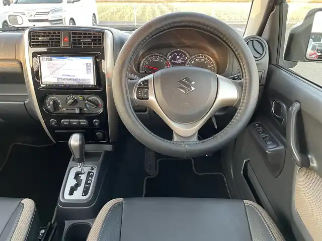 スズキ ジムニー ランドベンチャー 鳥取県 2017(平29)年 6.4万km パールホワイト ４ＷＤ・ターボ/社外ナビ／ＴＶ／ＤＶＤ／ＣＤ／ＢＴ/ＥＴＣ/ドライブレコーダー/レザーシート/前席シートヒーター/モンスタースポーツハイトアップスプリング/（純正車高　プラス20ｍｍ）/スズキスポーツショックアブソーバー/純正１６アルミホイール/キーレスキー/純正フォグランプ/電動格納ミラー/背面タイヤ/スペアキー