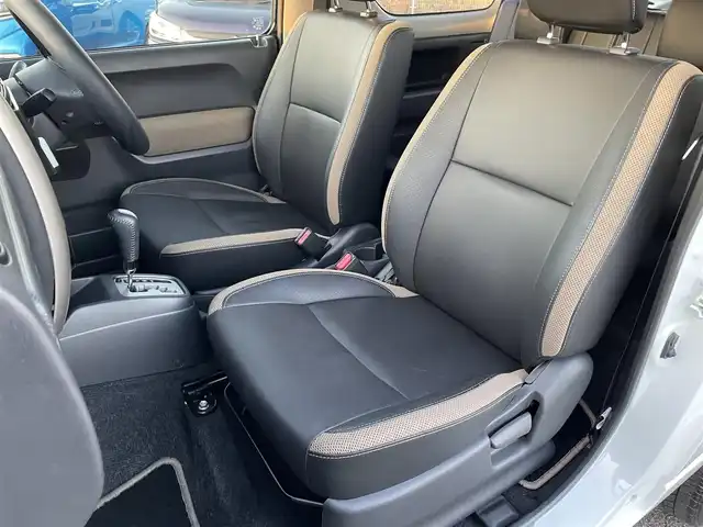 スズキ ジムニー ランドベンチャー 鳥取県 2017(平29)年 6.4万km パールホワイト ４ＷＤ・ターボ/社外ナビ／ＴＶ／ＤＶＤ／ＣＤ／ＢＴ/ＥＴＣ/ドライブレコーダー/レザーシート/前席シートヒーター/モンスタースポーツハイトアップスプリング/（純正車高　プラス20ｍｍ）/スズキスポーツショックアブソーバー/純正１６アルミホイール/キーレスキー/純正フォグランプ/電動格納ミラー/背面タイヤ/スペアキー