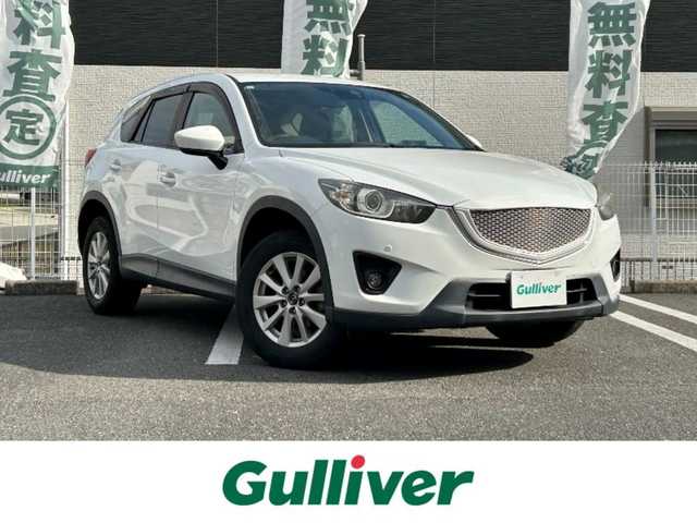 マツダ ＣＸ－５ 20S 三重県 2013(平25)年 6.6万km クリスタルホワイトパールマイカ 登録時65554km/ワンオーナー/社外ナビ(FM/AM/CD/DVD/Bluetooth/フルセグTV)/バックカメラ/ETC/禁煙車/TCS/RVM/i-stop/AFS/クルーズコントロール/社外フロアマット/スペアキー1本/AUTOライト(LED)/フォグランプ(LED)/12V120W/プッシュスタート/電格ミラー