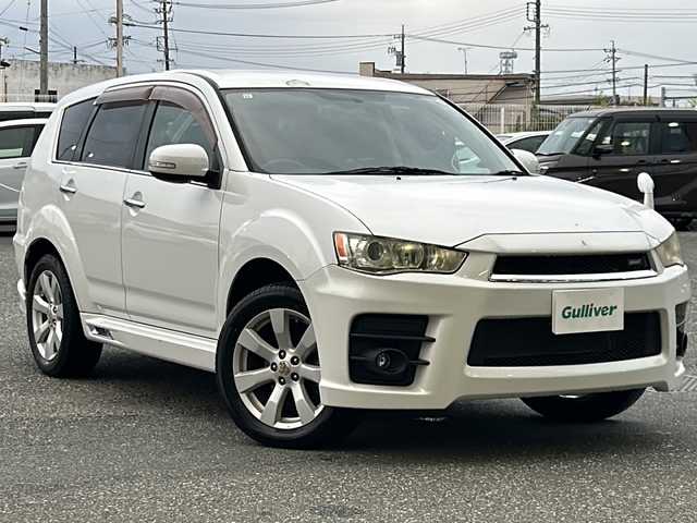 三菱 アウトランダー ROADEST 20G 愛知県 2011(平23)年 6万km シルキーホワイト 社外ナビ(SD、DVD.)/フルセグTV/パドルシフト/ハーフレザーシート/バックカメラ/革巻きステアリング/電格ミラー/ミラーウィンカー/アンダーミラー/純正フロアマット/純正アルミホイール/ドアバイザー/フォグランプ/ＥＴＣ/取扱説明書/保証書