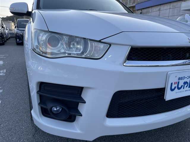 三菱 アウトランダー ROADEST 20G 兵庫県 2011(平23)年 6万km シルキーホワイト 社外ナビ(SD、DVD.)/フルセグTV/パドルシフト/ハーフレザーシート/バックカメラ/革巻きステアリング/電格ミラー/ミラーウィンカー/アンダーミラー/純正フロアマット/純正アルミホイール/ドアバイザー/フォグランプ/ＥＴＣ/取扱説明書/保証書