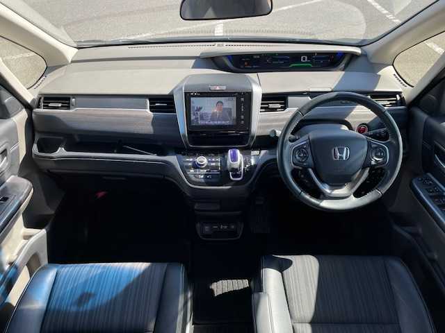 ホンダ フリード ハイブリット EX 長崎県 2016(平28)年 5.5万km クリスタルブラックパール 純正メモリーナビ/CD/DVD/BT/HDMI/USB/フルセグTV/バックカメラ/両側パワースライドドア/ホンダセンシング/レーダークルーズコントロール/レーンキープアシスト/ハーフレザーシート/D/N席シートヒーター/ドライブレコーダー前後/ステアリングスイッチ/LEDヘッドライト/ビルトインETC