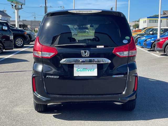 ホンダ フリード ハイブリット EX 長崎県 2016(平28)年 5.5万km クリスタルブラックパール 純正メモリーナビ/CD/DVD/BT/HDMI/USB/フルセグTV/バックカメラ/両側パワースライドドア/ホンダセンシング/レーダークルーズコントロール/レーンキープアシスト/ハーフレザーシート/D/N席シートヒーター/ドライブレコーダー前後/ステアリングスイッチ/LEDヘッドライト/ビルトインETC