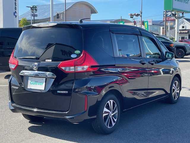 ホンダ フリード ハイブリット EX 長崎県 2016(平28)年 5.5万km クリスタルブラックパール 純正メモリーナビ/CD/DVD/BT/HDMI/USB/フルセグTV/バックカメラ/両側パワースライドドア/ホンダセンシング/レーダークルーズコントロール/レーンキープアシスト/ハーフレザーシート/D/N席シートヒーター/ドライブレコーダー前後/ステアリングスイッチ/LEDヘッドライト/ビルトインETC