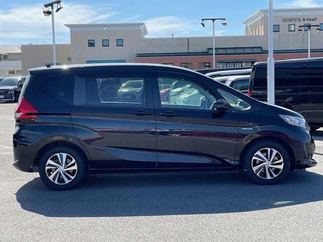 ホンダ フリード ハイブリット EX 長崎県 2016(平28)年 5.5万km クリスタルブラックパール 純正メモリーナビ/CD/DVD/BT/HDMI/USB/フルセグTV/バックカメラ/両側パワースライドドア/ホンダセンシング/レーダークルーズコントロール/レーンキープアシスト/ハーフレザーシート/D/N席シートヒーター/ドライブレコーダー前後/ステアリングスイッチ/LEDヘッドライト/ビルトインETC