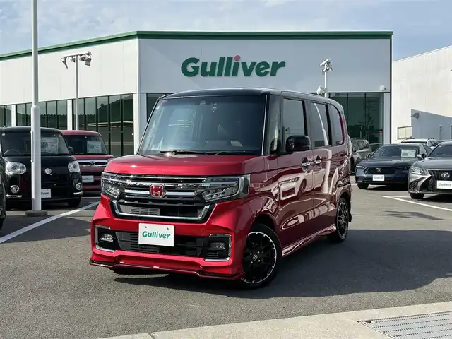 ホンダ Ｎ ＢＯＸ カスタム L ターボ コーディネートスタイル 愛媛県 2021(令3)年 5.3万km プレミアムクリスタルレッドM 登録時走行距離：52267km/社外ナビ/CD/DVD/BT/フルセグTV/HDMI/ETC/バックカメラ/デジタルインナーミラー/パドルシフト/追従クルコン/レーンキープアシスト/パーキングアシスト/衝突軽減システム/横滑り防止装置/盗難防止装置/両側パワスラ/社外エアロ(F/S/R)/LEDヘッドライト/LEDフォグランプ/オートライト/エンジンスタートボタン/スマートキー/純正アルミホイール