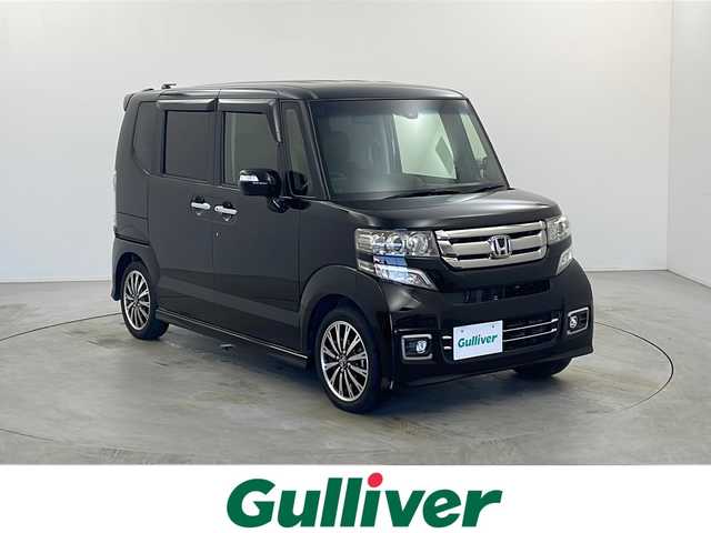 ホンダ Ｎ ＢＯＸ カスタム G ターボ Lパッケージ 栃木県 2015(平27)年 5.8万km スマートブラック KENWOOD7インチナビ/【CD/DVD/フルセグTV】/あんしんパッケージ/シティブレーキアクティブシステム/・低速域衝突軽減ブレーキ＋誤発進抑制機能/ハーフレザーシート/両側パワースライドドア/ディスチャージヘッドライト/バックカメラ/ETC/純正フロアマット/ドアバイザー/スーパーＵＶカットフロントドアガラス/　ＩＲカットフロントウィンドウ・フロントドアガラス/リア席サンシェード/純正15インチアルミホイール/プッシュスタート/ステアリングリモコン/スペアキー1本