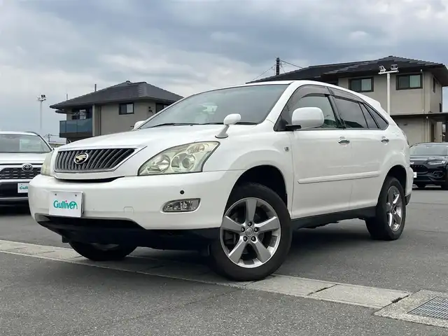 トヨタ ハリアー 240G プレミアム Lパッケージ 静岡県 2007(平19)年 10.9万km ホワイトパールクリスタルシャイン パワーステアリング/パワーウィンドウ/リモコンキー/スペアキー１本/オートエアコン/ETC/純正ナビ（CD.DVD.MD）/純正フロアマット/純正アルミホイール/D席N席パワーシート/ABS/AFS/コーナーセンサー前後/盗難防止装置/オートライト/Wエアバック
