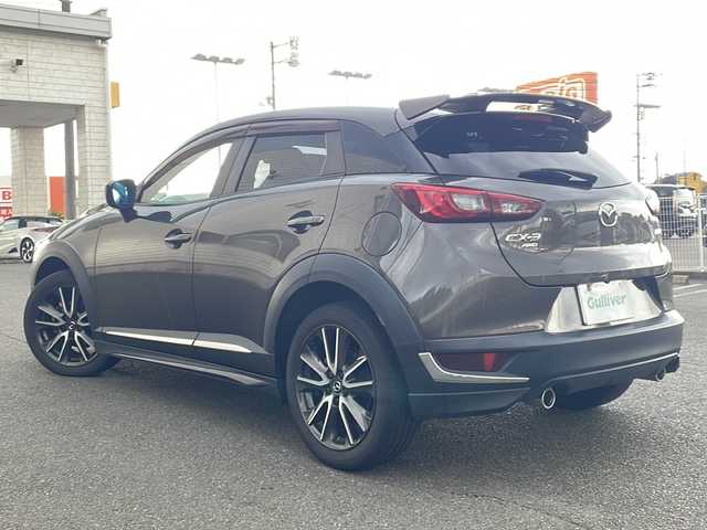 マツダ ＣＸ－３ XD ツーリング Lパッケージ 山口県 2015(平27)年 4.1万km チタニウムフラッシュマイカ ワンオーナー/純正SDナビ/AM/FM/CD/DVD/BT/USB/フルセグTV/バックカメラ/ハーフレザーシート/シートヒーター/純正アルミ/エアバッグダブル＋サイド/Boseサウンドシステム/i-ELOOP搭載/コーナーセンサー/パドルシフト/アイドリングストップ/レーンキープアシスト/TCS/クルーズコントロール/横滑り防止機能装置/プリクラッシュ/ステアリングスイッチ/スタッドレスタイヤ積み込み/４WD/保証書/取扱説明書