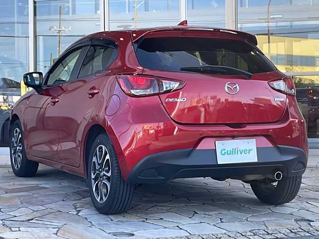 マツダ デミオ XD ツーリング 静岡県 2015(平27)年 6.2万km ソウルレッドプレミアムメタリック 純正ナビ/・ラジオ/フルセグTV/・USB/CD/DVD/AUX/主要装備/・レーダークルーズコントロール　/・ＥＴＣ　/・バックカメラ　/・ヘッドアップディスプレイ　/・ステアリングリモコン　/・パドルシフト　/・スマートシティブレーキサポート　/・オートライト　/・純正フロアマット　/・スマートキー/・アイドリングストップ/・純正アルミホイール/・コーナーセンサー/・フォグランプ/・盗難防止装置/・横滑り防止装置