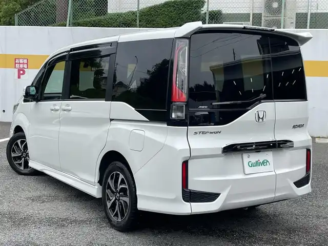 ホンダ ステップワゴン スパーダ ホンダセンシング 神奈川県 2018(平30)年 1.1万km プラチナホワイトパール ワンオーナー /4WD/登録時10493キロ/●ギャザーズ10インチナビVXU-187SWi/CD /DVD /SD /USB /フルセグ/●ナビ連動ドラレコ/●全方位カメラ/●ビルトインETC/●Honda SENSING/衝突軽減ブレーキ〈CMBS〉/誤発進抑制機能/歩行者事故低減ステアリング/路外逸脱抑制機能/ACC〈アダプティブ・クルーズ・コントロール〉/LKAS〈車線維持支援システム〉/先行車発進お知らせ機能/標識認識機能/●LEDヘッドライト/●LEDフォグライト/●本革巻ステアリング/●SPADA専用テールゲートスポイラー/●SPADA専用16インチアルミ/●パドルシフト/●リア両側パワースライドドア/●わくわくゲート/●シートバックテーブル（運転席/助手席）/●ロールサンシェイド/●サイドエアバッグ/●サイドカーテンエアバッグ/スマートキー×2/新車時保証書/取扱説明書/ナビ取扱説明書