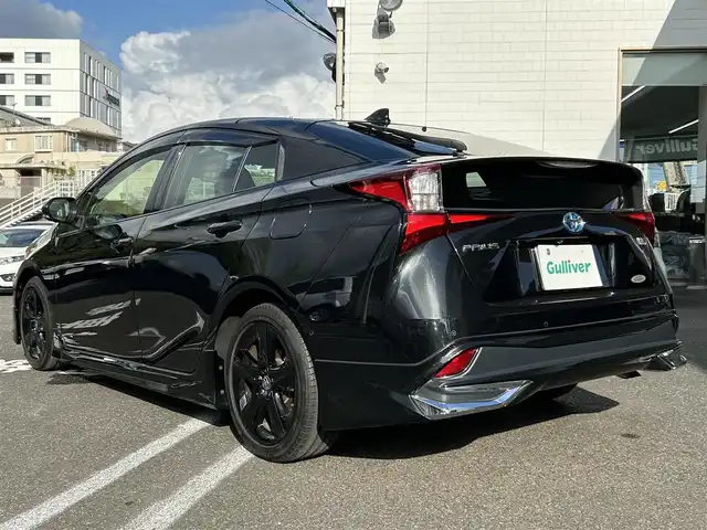 トヨタ プリウス A ツーリングセレ ブラックED 長崎県 2022(令4)年 0.7万km プレシャスブラックパール 純正ディスプレイオーディオ(FM/AM/BT/ナビ)/全方位カメラ/ステアリングリモコン/クルーズコントロール/プッシュスタート/スマートキー/スペアキー/ヘッドアップディスプレイ/運転席パワーシート/前席シートヒーター/100V充電/ビルトインETC/ドラレコ/純正フロアマット/電動格納ミラー/ドアバイザー/モデリスタフルエアロ/クリアランスソナー/ABS/横滑り防止装置/レーンキープアシスト/盗難防止装置/オートライト/オートハイビーム/SRSダブルエアバッグ/車両接近通報装置/取扱説明書/保証書/記録簿