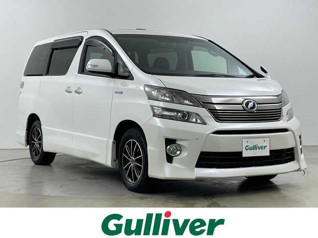 トヨタ ヴェルファイア ハイブリット ZR Gエディション 道央・札幌 2012(平24)年 7万km ホワイトパールクリスタルシャイン ・4WD  / ハイブリッド/・寒冷地仕様/・ツインムーンルーフ/・トヨタプレミアムサウンドシステム/・純正フリップダウンモニター/・純正メーカーOPナビ/・BT/DVD/CD/フルセグ/・USB接続/・バックカメラ/・両側パワースライドドア/・パワーバックドア/・クルーズコントロール/・HIDオートライト/フォグランプ/・黒本革シート/・メモリーパワーシート/シートヒーター/・AC100V/・スマートキー/プッシュスタート/・ETC/・AFS