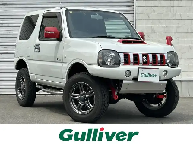 スズキ ジムニー クロスアドベンチャー 道東・釧路十勝 2014(平26)年 4.9万km パールホワイト パートタイム4WD/社外ナビ/(AM FM BT CD DVD フルセグTV)/バックカメラ/シートヒーター /リフトアップ/ETC/社外足回り/社外ステップ/社外前後バンパー/社外スキッドプレート/純正フロアマット/ドアバイザー/革巻きステアリング/LEDヘッドライト/フォグランプ/社外ナンバー移動キット
