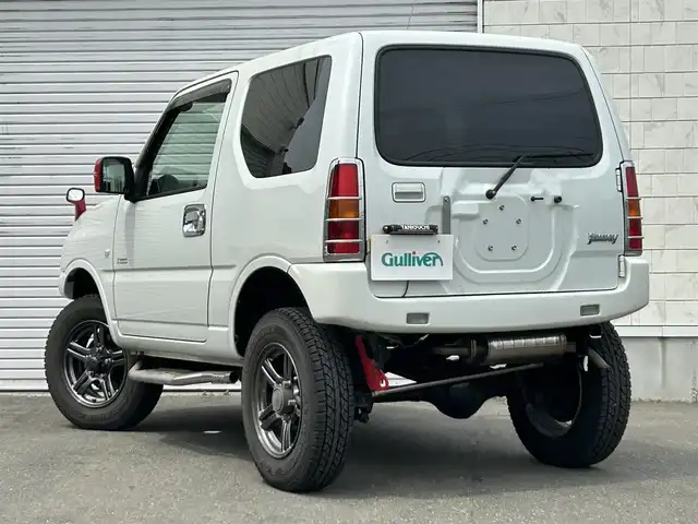 スズキ ジムニー クロスアドベンチャー 道東・釧路十勝 2014(平26)年 4.9万km パールホワイト パートタイム4WD/社外ナビ/(AM FM BT CD DVD フルセグTV)/バックカメラ/シートヒーター /リフトアップ/ETC/社外足回り/社外ステップ/社外前後バンパー/社外スキッドプレート/純正フロアマット/ドアバイザー/革巻きステアリング/LEDヘッドライト/フォグランプ/社外ナンバー移動キット
